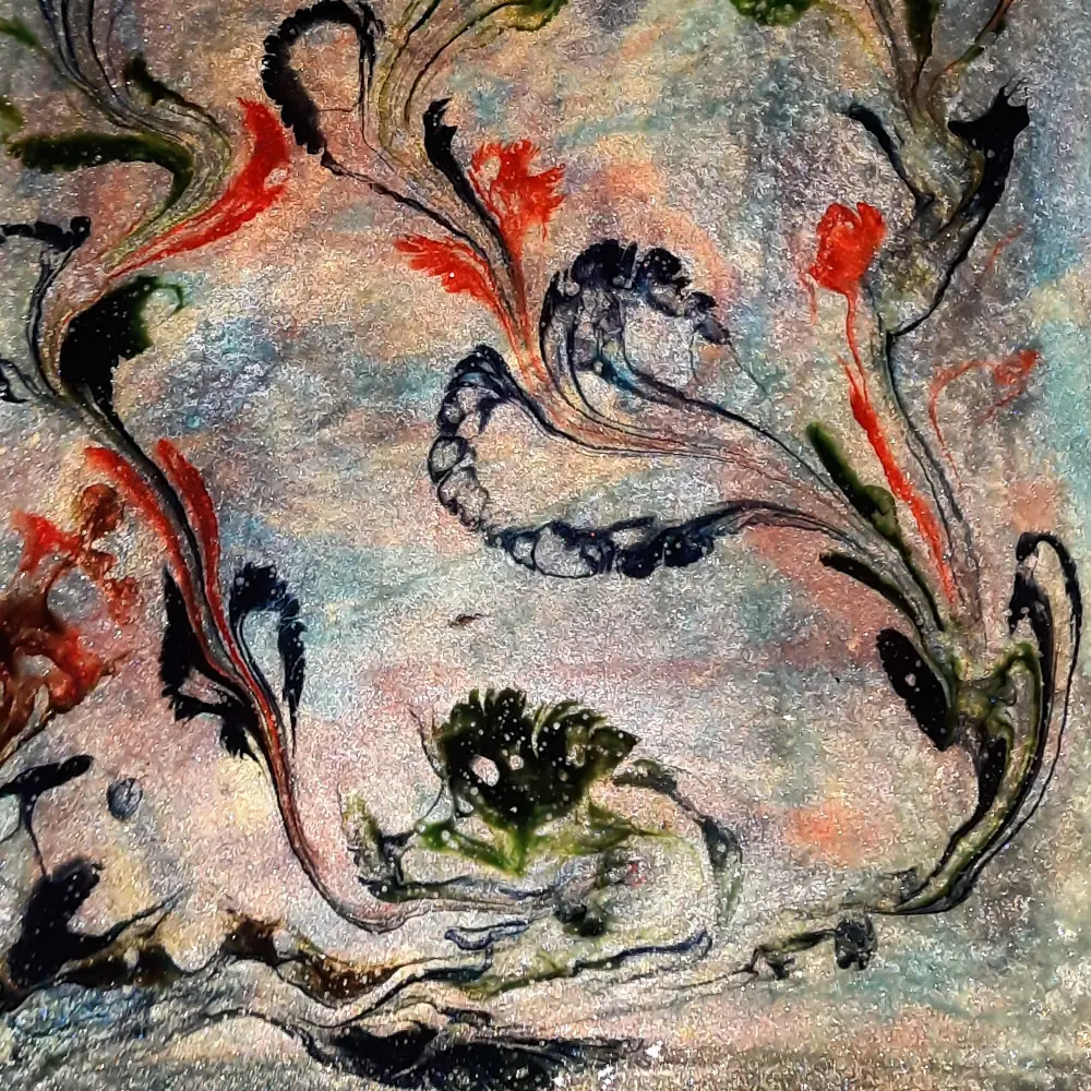 Detail of some flowery-looking swirls from an epoxy resin coated bench