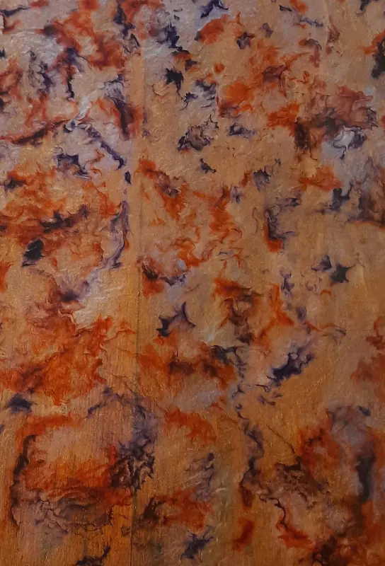 A worktop in epoxy resin, with a pattern fondly referred to by the maker as 'alien vomit'