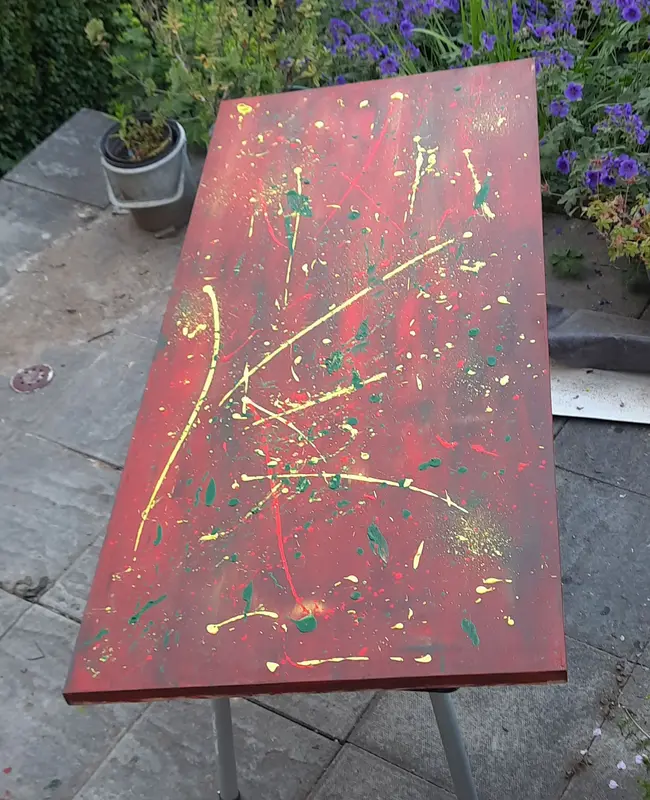 The pimping started - restoration of a drab wardrobe door,
with a red acrylic base and abstract expressionist energy