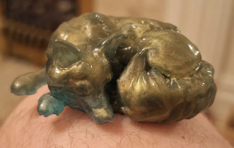 A sleeping fox made of epoxy resin - ornamental purposes only
