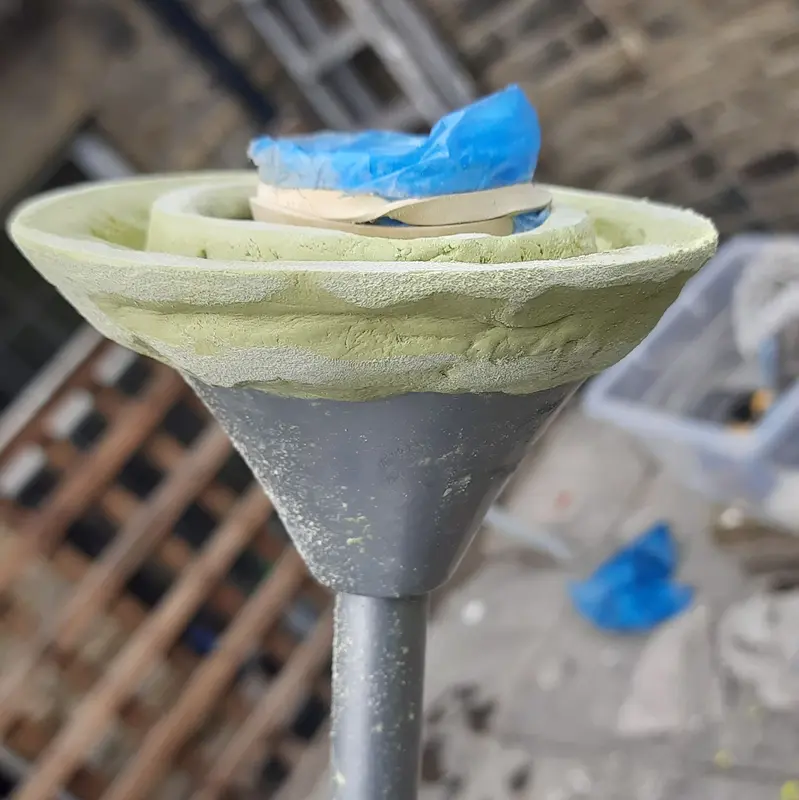 A lampstand restoration project, using epoxy putty and spray paint, completed