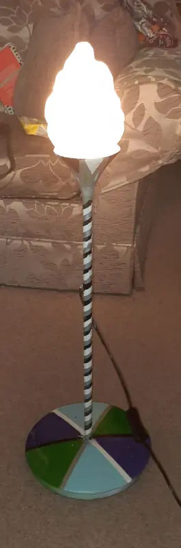 A lampstand restoration project, using epoxy putty and spray paint, completed